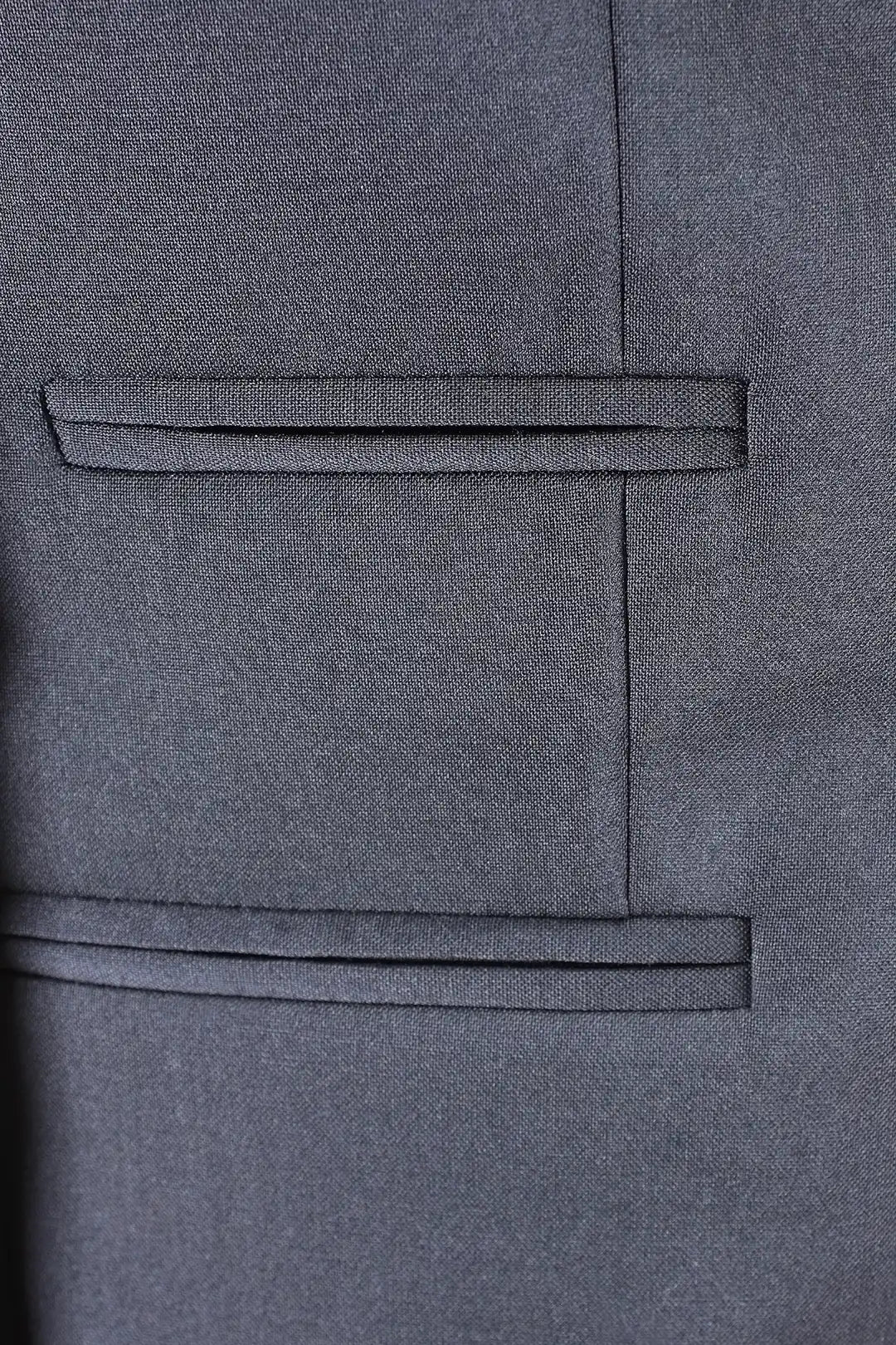 Giacca in tela di lana blu con rever profilato nero filetti