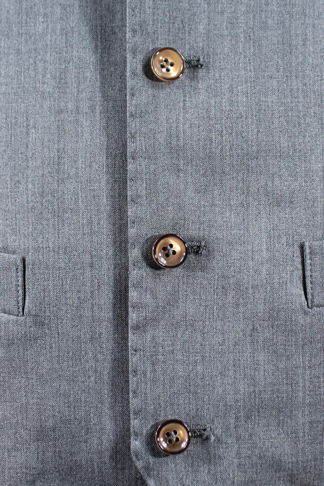 Gilet in pura lana grigia bottoni