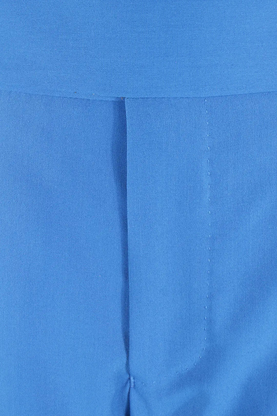 Pantalone con fibbie laterali in jersey azzurro patta