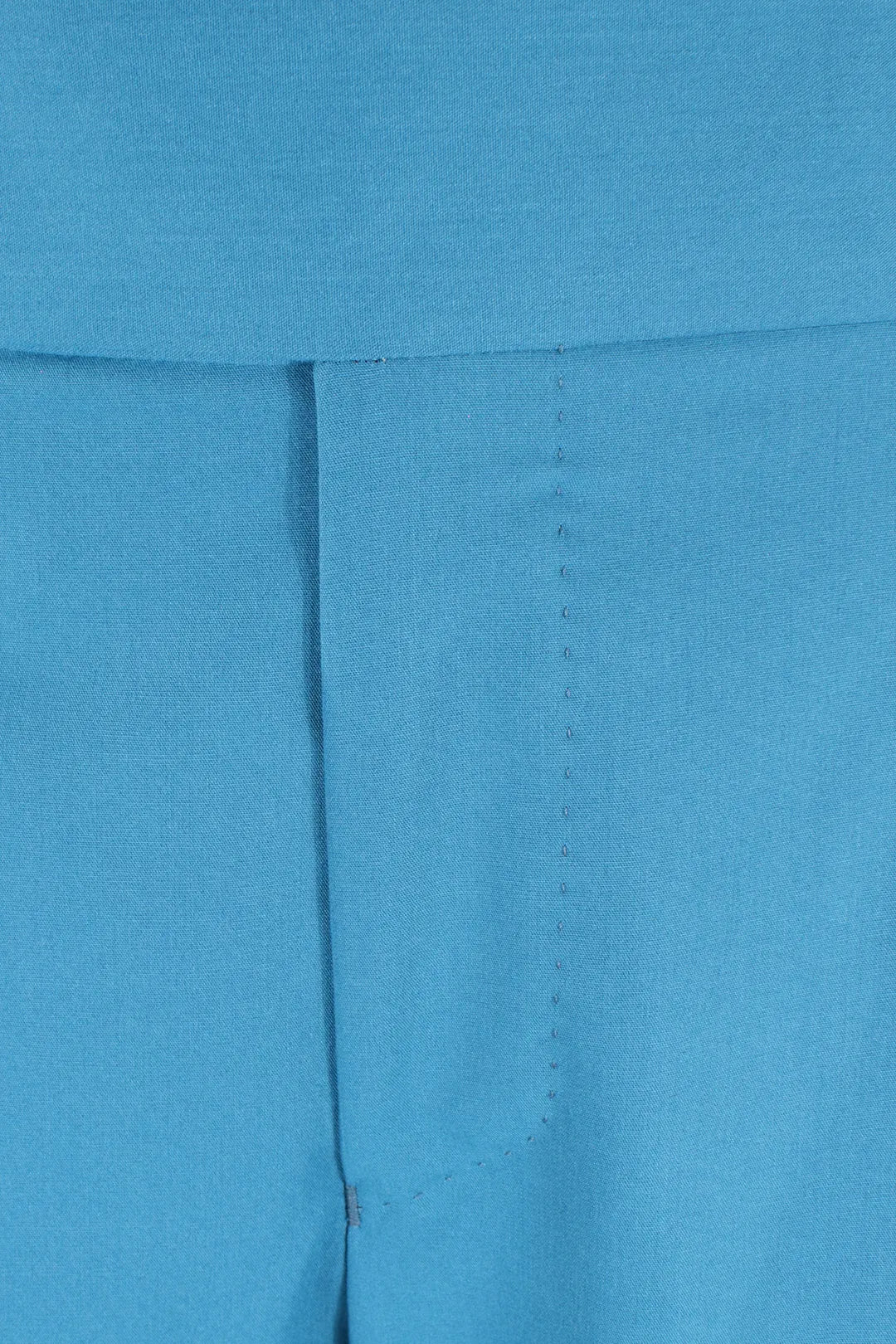 Pantalone con fibbie laterali in jersey turchese patta