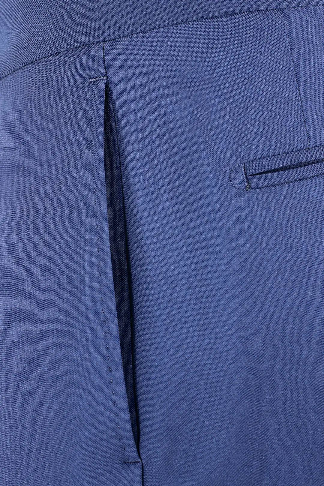 Pantalone con pince in tela di lana blu tasca