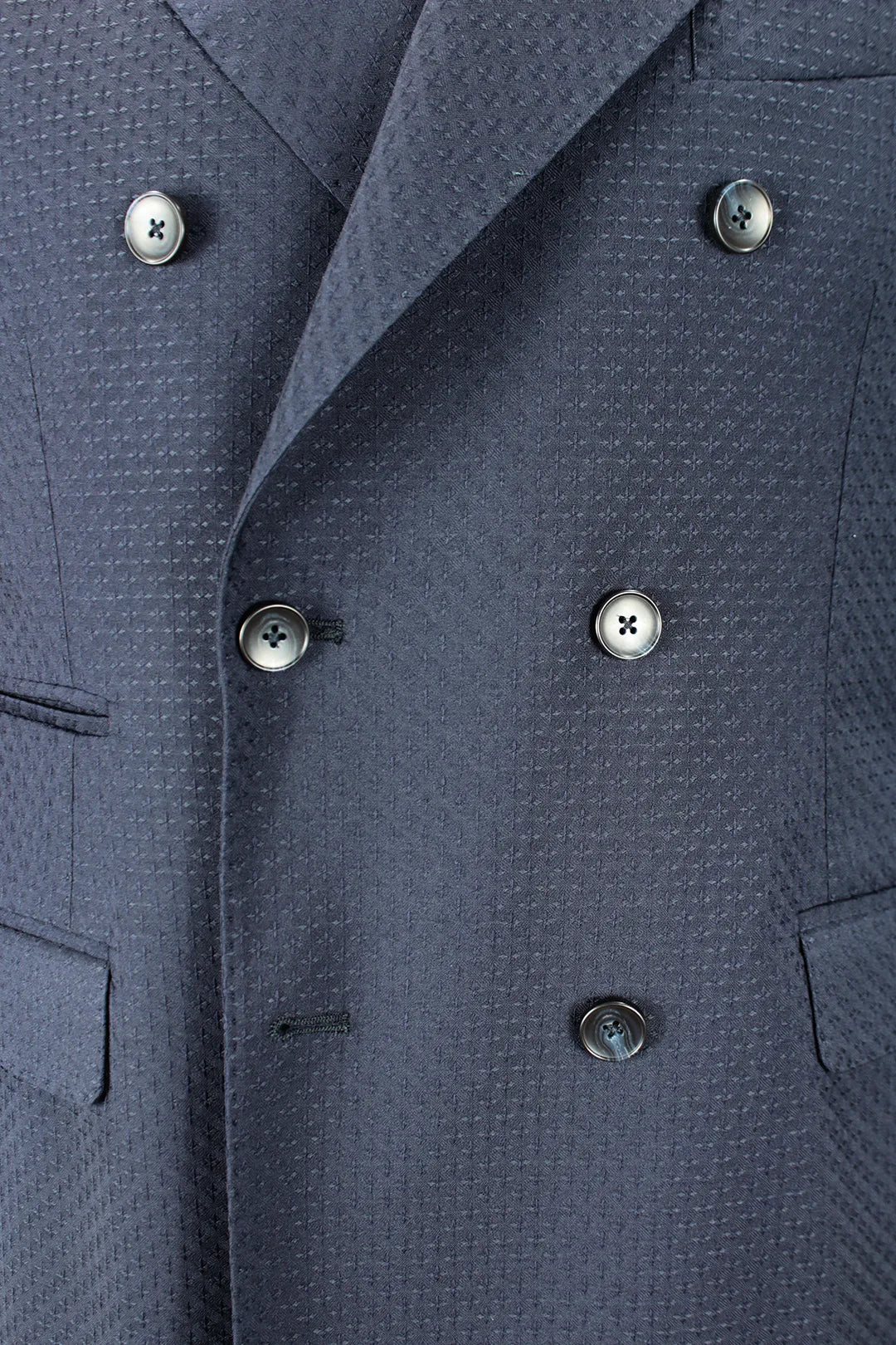 Giacca doppiopetto in lana blu operata bottoni