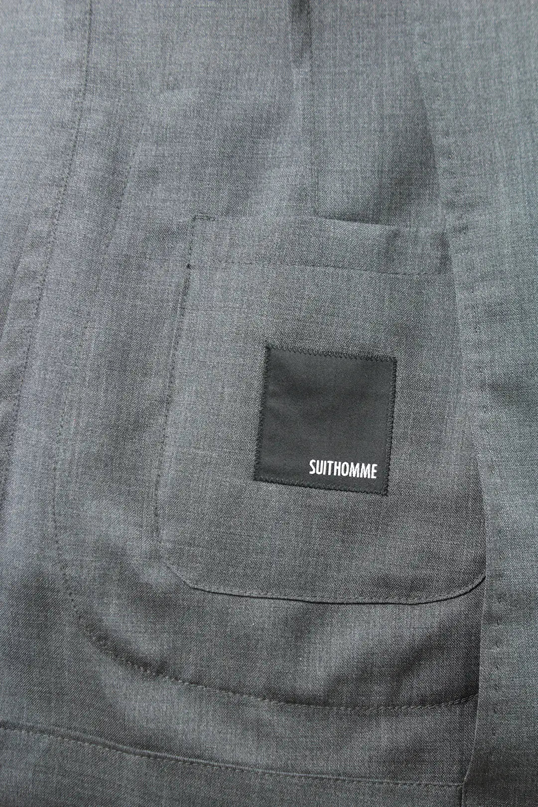 Giacca sfoderata in tela di lana grigio brand