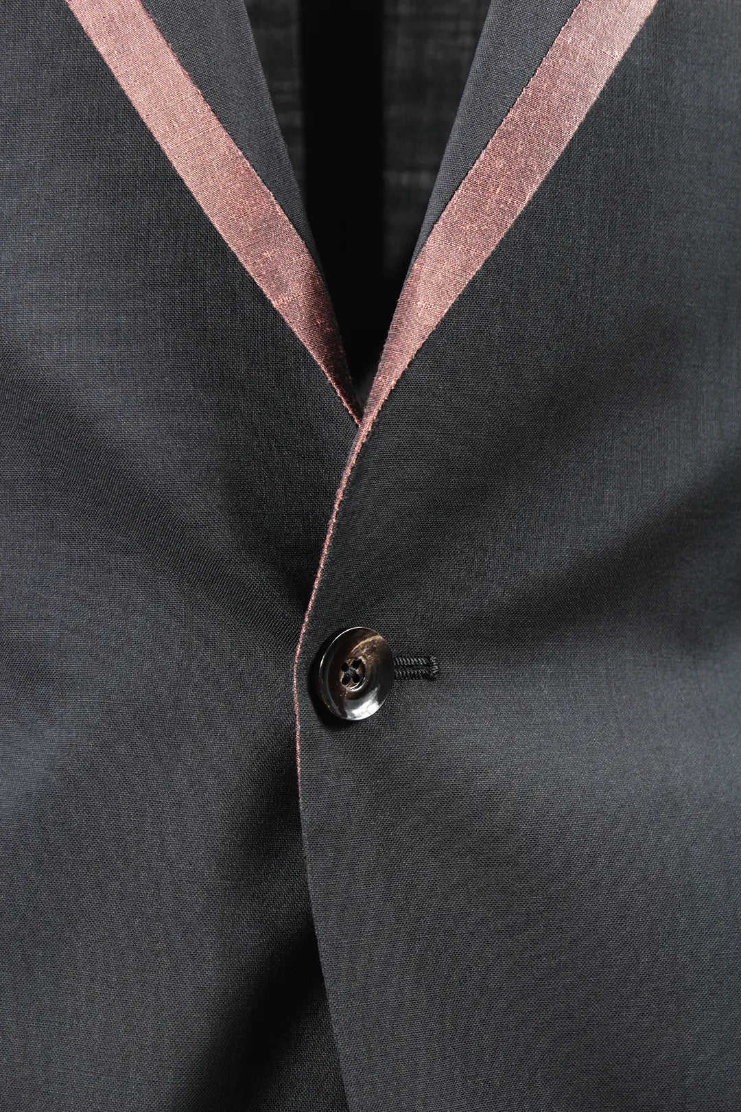 Giacca tela di lana nera rever profilato rame profilo