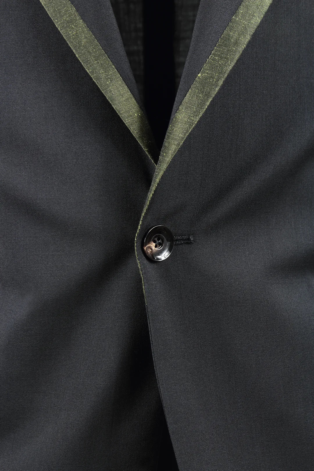 Giacca tela di lana nera rever profilato verde bottone