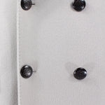 Cappotto doppiopetto in lana grigio perla bottoni