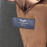 Cappotto doppiopetto con cintura in lana grigia tessuto