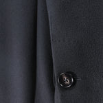 Cappotto in lana nera manica