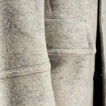 Cappotto doppiopetto in lana e cotone bianco manica