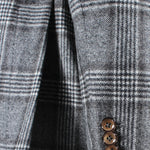 Giacca doppiopetto in lana Principe di Galles manica