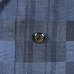 Giacca doppiopetto in lana blu a quadri bottone