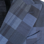 Giacca doppiopetto in lana blu a quadri rever