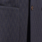 Giacca doppiopetto in lana chevron blu tasca