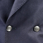 Giacca doppiopetto in tessuto piquet blu bottoni