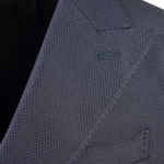 Giacca doppiopetto in tessuto piquet blu rever