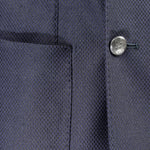 Giacca doppiopetto in tessuto piquet blu tasca