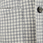 Giacca doppiopetto in lana a quadretti tasca