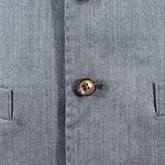 Gilet in pura lana grigia bottoni