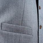 Gilet in pura lana grigia tasca