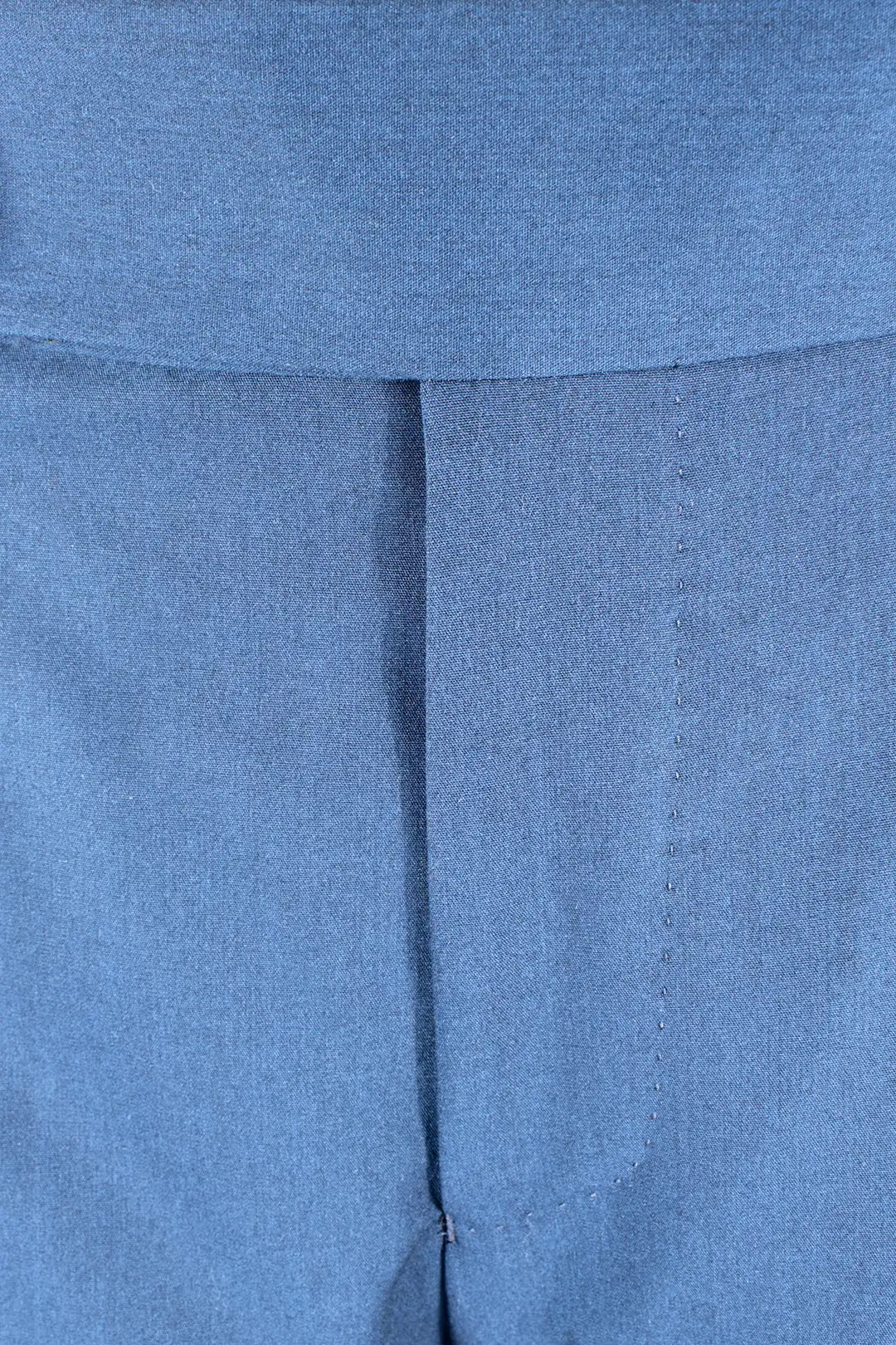 Pantalone con fibbie laterali in jersey blu patta