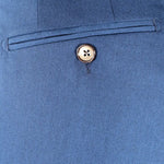 Pantalone con fibbie laterali in jersey blu taschino