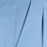 Pantalone con fibbie laterali in jersey celeste tasca