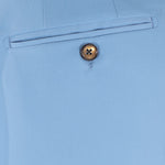 Pantalone con fibbie laterali in jersey celeste taschino
