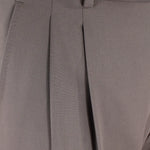 Pantalone con fibbie laterali in jersey greige pince