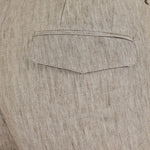 Pantalone con pince e coulisse in lino corda taschino