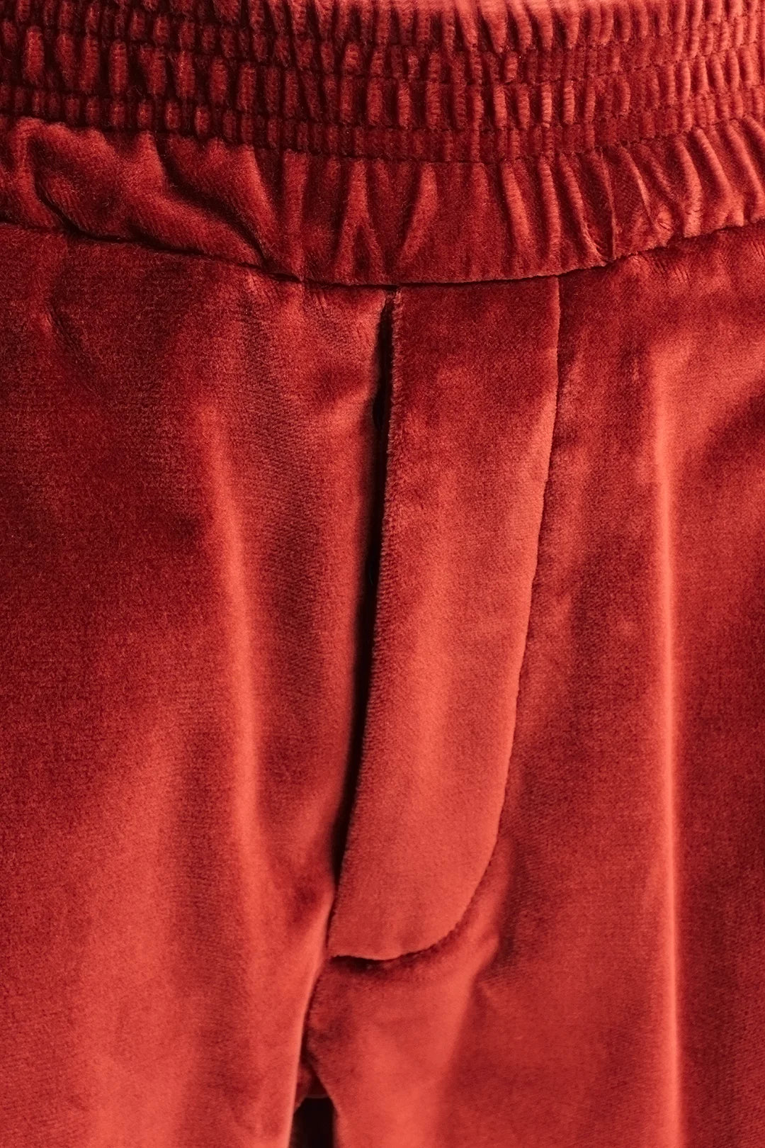 Pantalone con elastico in velluto liscio ruggine patta