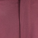 Pantalone loose fit con pince in jersey bordeaux patta