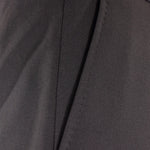 Pantalone loose fit con pince in jersey marrone tasca