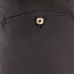 Pantalone loose fit con pince in jersey marrone taschino