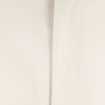 Pantalone loose fit con pince in jersey sabbia patta