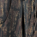 Pantalone con pince e coulisse in lana e cotone camouflage lato