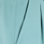 Pantalone con fibbie laterali in jersey verde acqua tasca