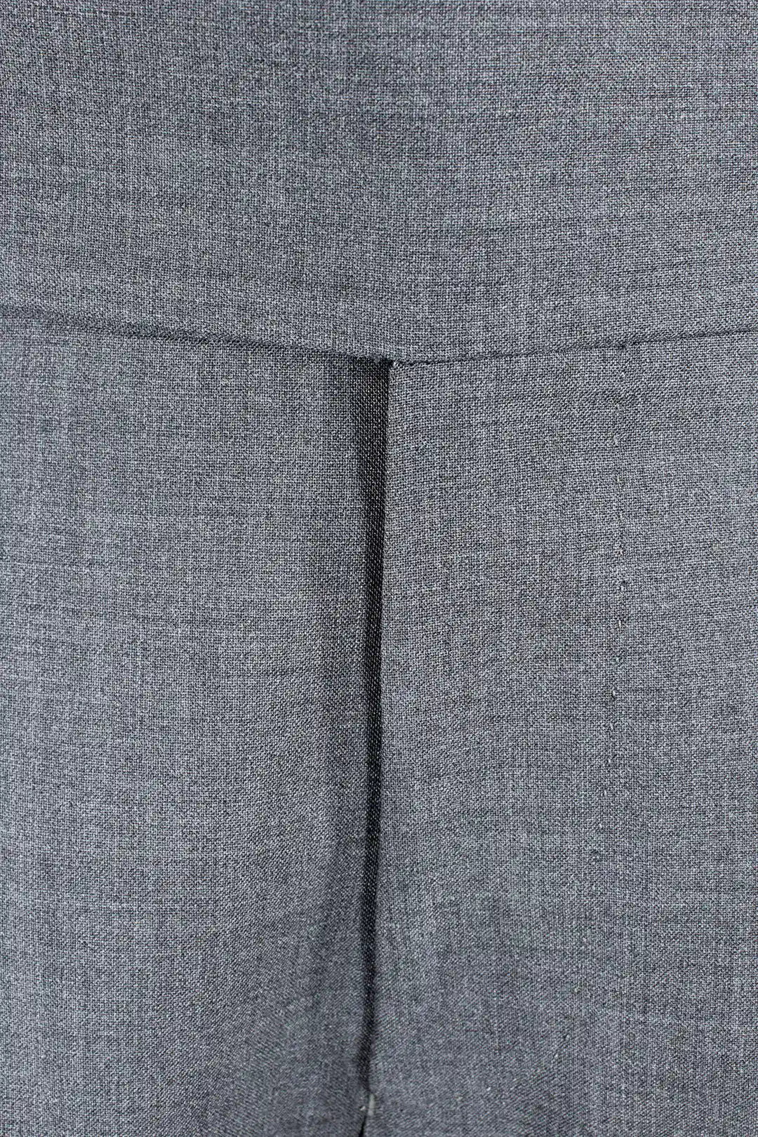 Pantalone con pince in tela di lana grigio patta