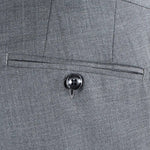 Pantalone con pince in tela di lana grigio taschino