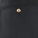 Pantalone con fibbie laterali in jersey nero taschino