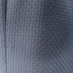 Giacca doppiopetto in lana blu operata texture
