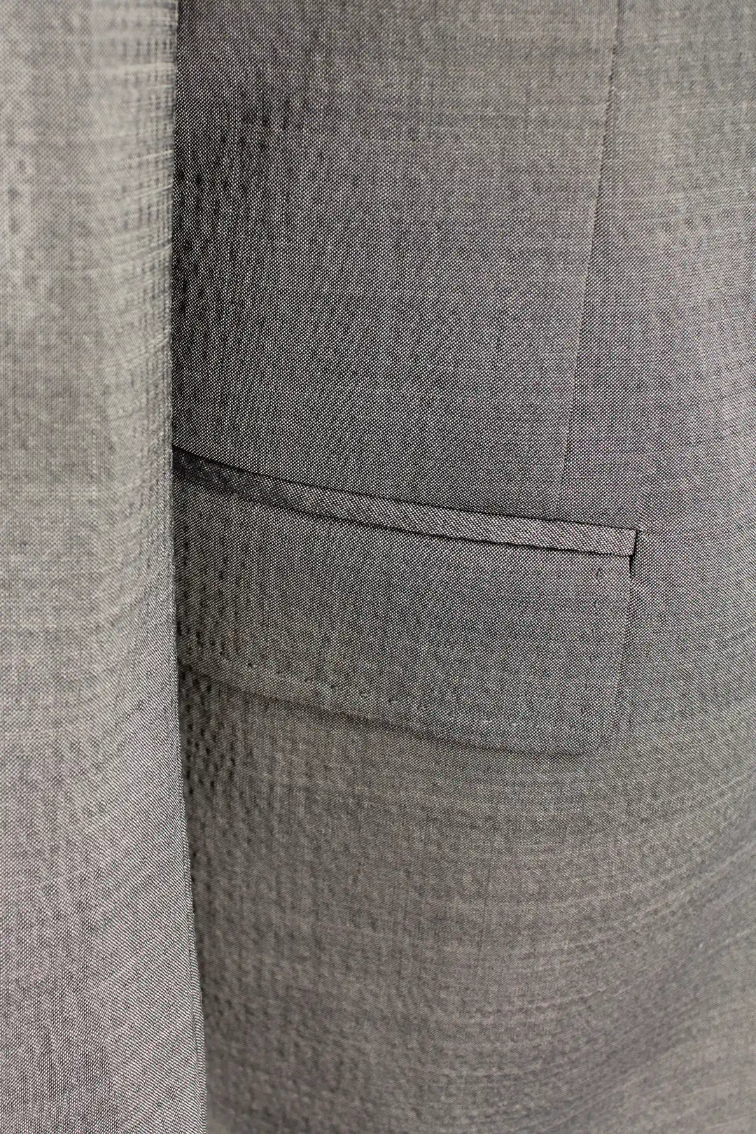 Giacca in lana seersucker grigia patta